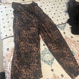 SHEIN Draw String Cheetah & Camo baggy flare pants. Unused. Selling both pairs